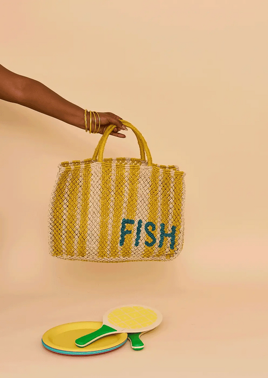 Yellow and cream striped macrame bag with Fish 'n' Chips in blue writing 