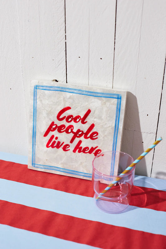 Cool people live here red writing capiz-shell hanging tile 